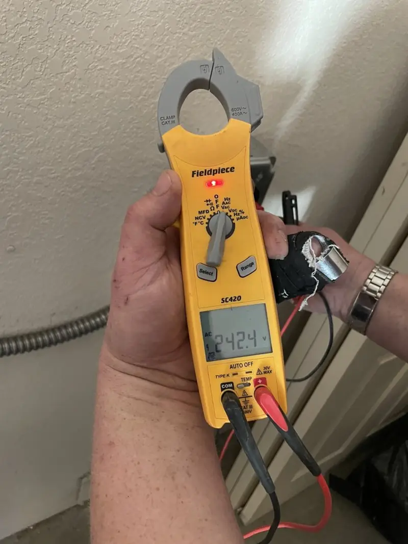 Voltage testing with clamp meter during Generator Installation in Silver Lake